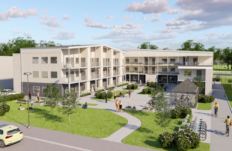Fågelvy över planerat bostadsområde med låg bebyggelse och innergård.